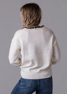 Pull col V beige détails léopard 