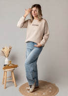 Sweat molletonné beige imprimé dos World Tour Iconic