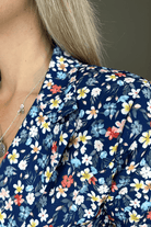 Blazer bleu motif fleuri 